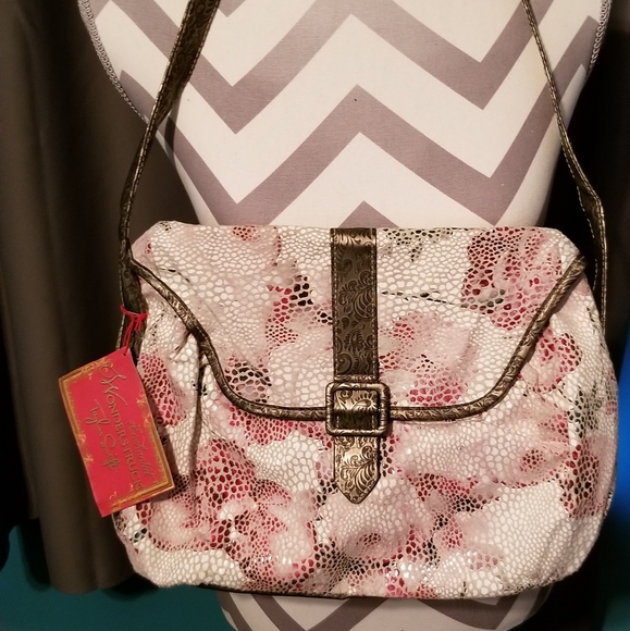 Taylor Swift Handbags - NWT, ENCHANTED WONDERSTRUCK TAYLOR  SWIFT BAG. BUTTON CLOSURE.